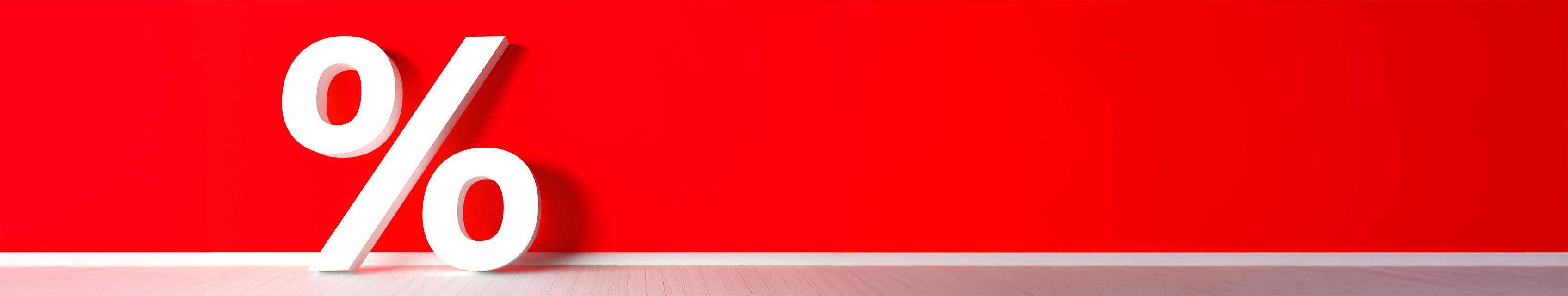 Imagebild: riesengrosses Prozentzeichen vor rotem Hintergrund