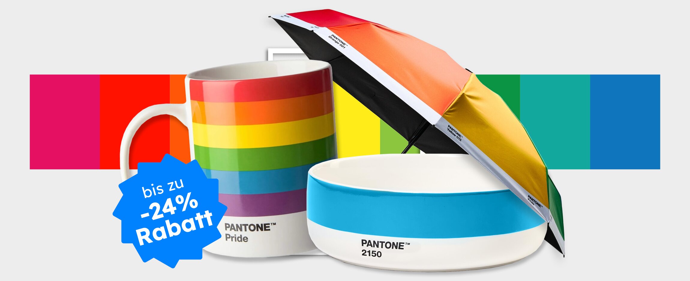 Pantone Lifestyle-Produkte mit Regenbogentasse, Schale und Regenschirm sowie Störer: „Bis zu 24 % Rabatt“.